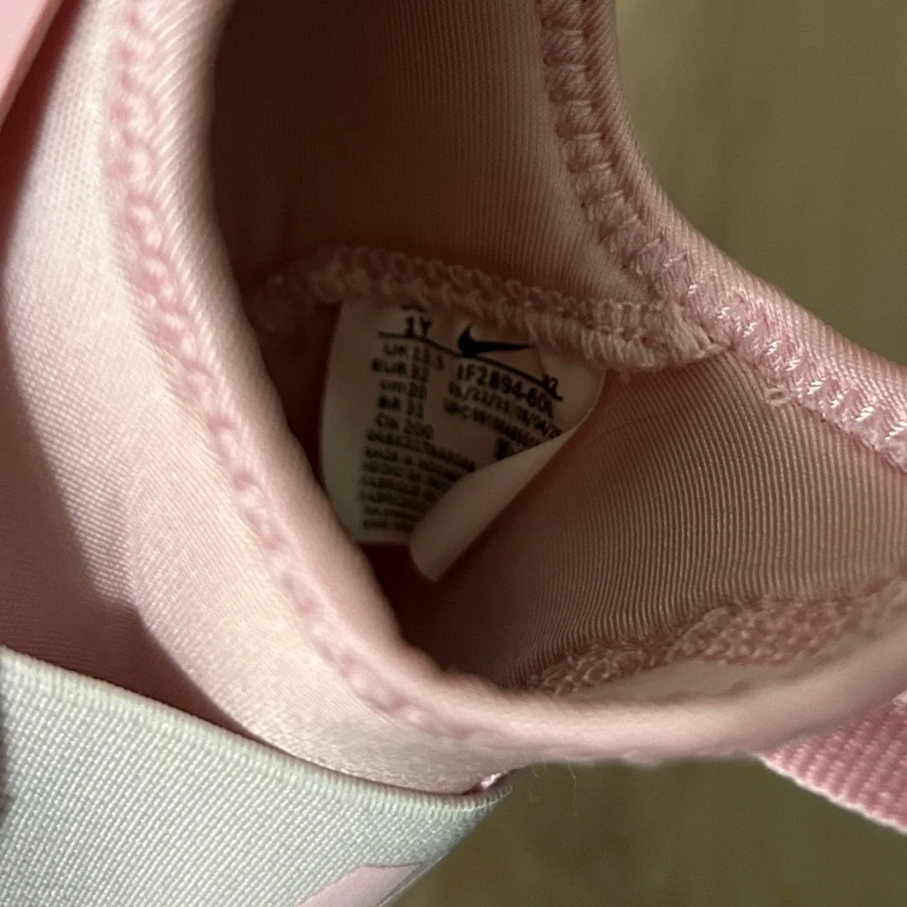 Girls Nike size 1 slip on pink shoes